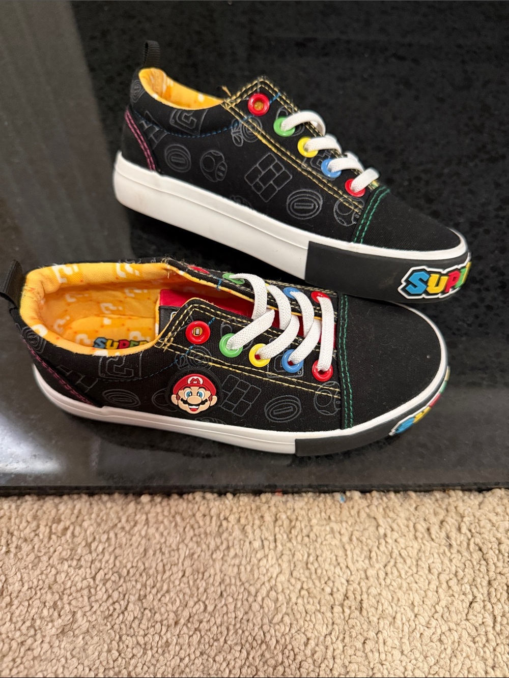Nintendo Black Low-Top Sneakers with Rainbow Accents